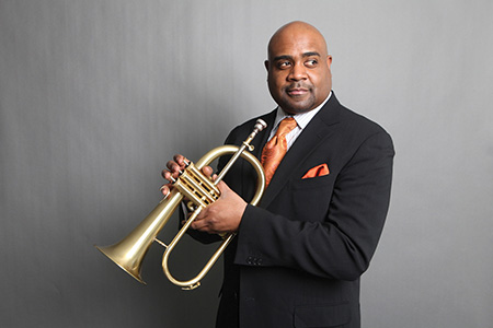 posed photo of Terell Stafford holding trumpet
