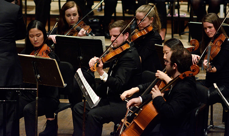 Photo: Members of the MSU Symphony Orchestra perform on Cobb Great Hall stage of Wharton Center for Performing Arts.