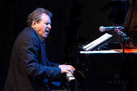 Photo of Bruce Barth performing on the piano