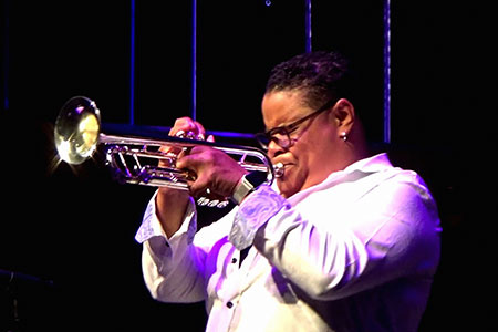 portrait, Tanya Darby performing, jazz trumpet