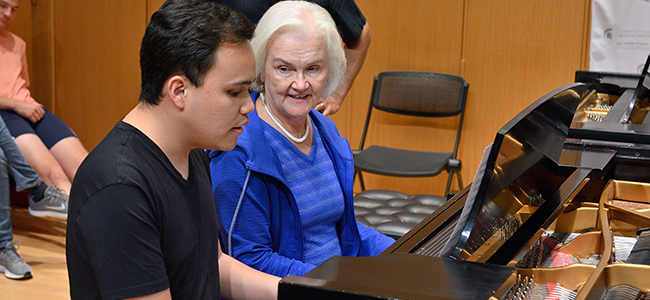 Deborah Moriarty works with Kodi Lee during a master class. image