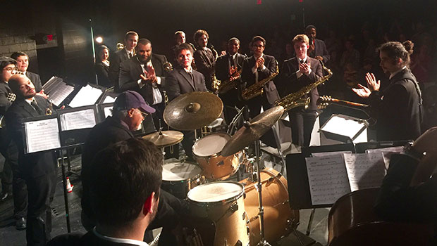 MSU Jazz Orchestra 1 applauds Jimmy Cobb during their performance at Hackett Catholic Central. image