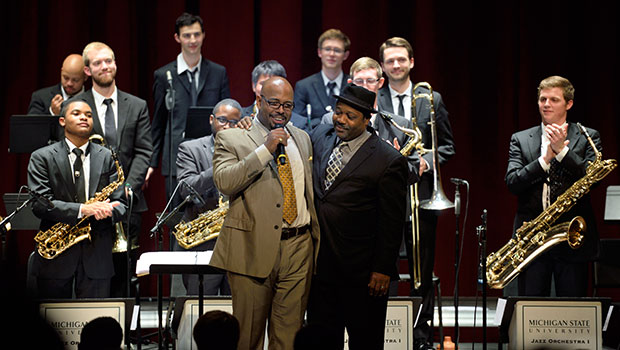 Christian McBride and Rodney Whitaker acknowledge the week’s residency on stage with MSU Jazz Orchestra.
 image