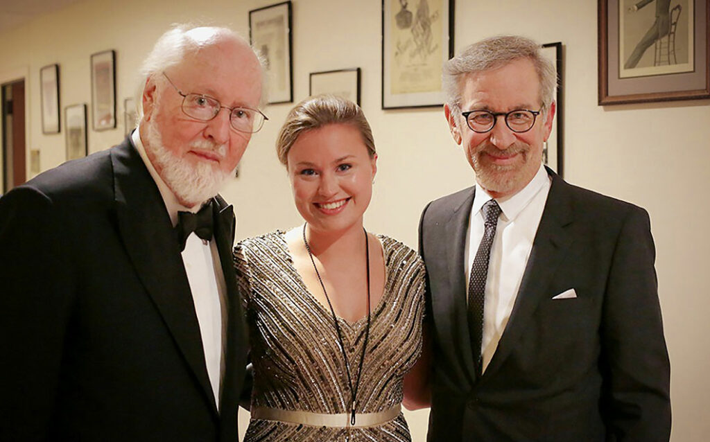 Three people smiling for a photo