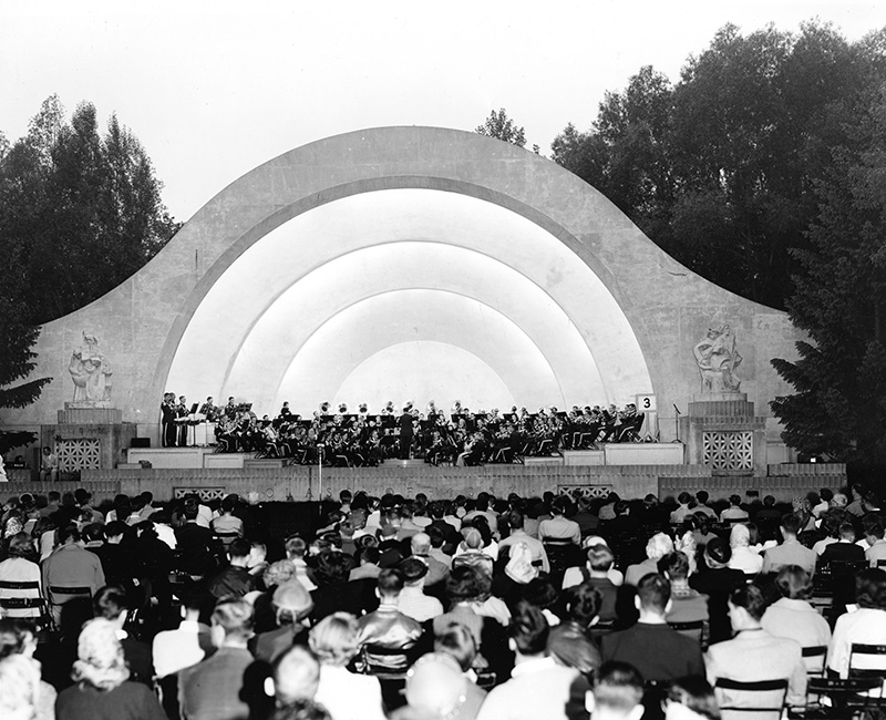 archival photo of an outdoor band shell made of concrete.