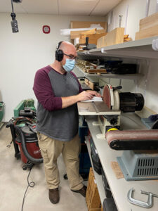 Dave Carr working in the piano shop