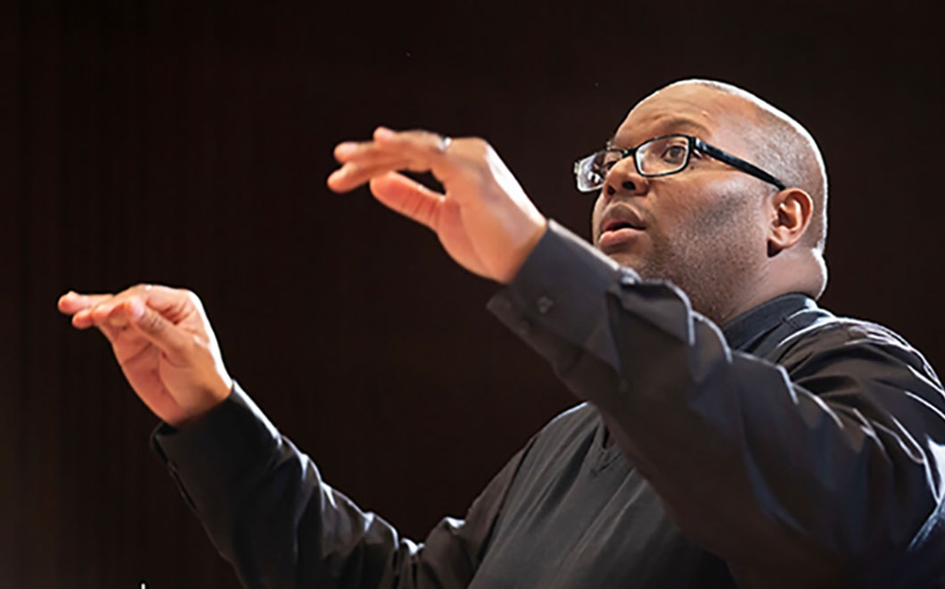 close up of Derrick Fox conducting