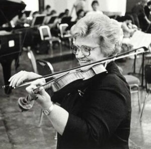 Black and white photo of Dorothy DeLay playing violin