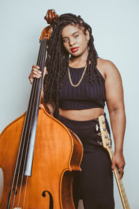 Endea Owens headshot with her bass