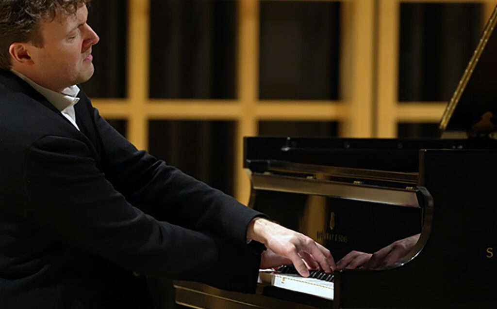 Eric Zuber playing piano