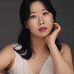 photo portrait, Sunah Jeong looking at camera with subtle smile