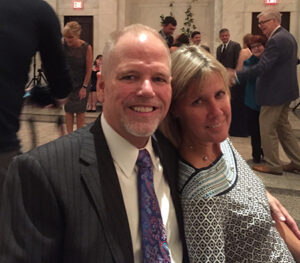 Joe and Jeanne Maguire smiling for a photo