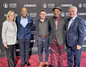 MSU faculty smiling on the red carpet