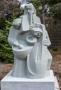 Concrete sculpture called Three Musicians