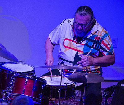 man playing drums