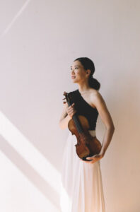 Yvonne Lam poses with her violin