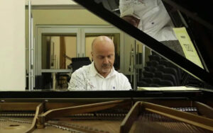 Antonia Di Cristofano playing piano.