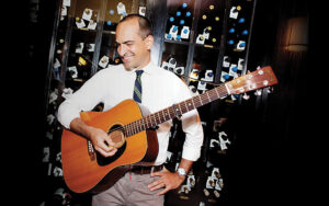 Dr. Trevor DeClercq, Middle Tennessee University Guest Theory Lecture. Dr. Trevor DeClercq holding guitar