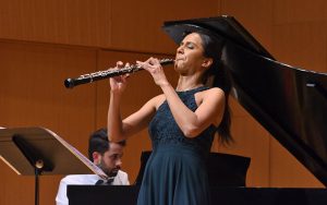 Image of Nermis Mieses playing the oboe, accompanied by Xavier Suarez at the piano.