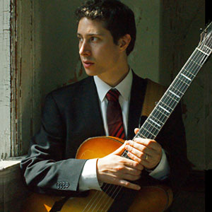 Photo of Randy Napoleon with his guitar