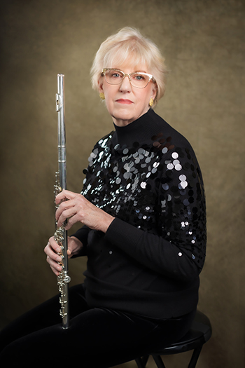 person holding flute