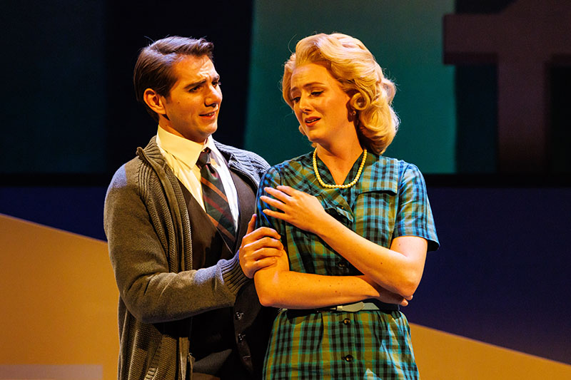 two people in costume on a stage