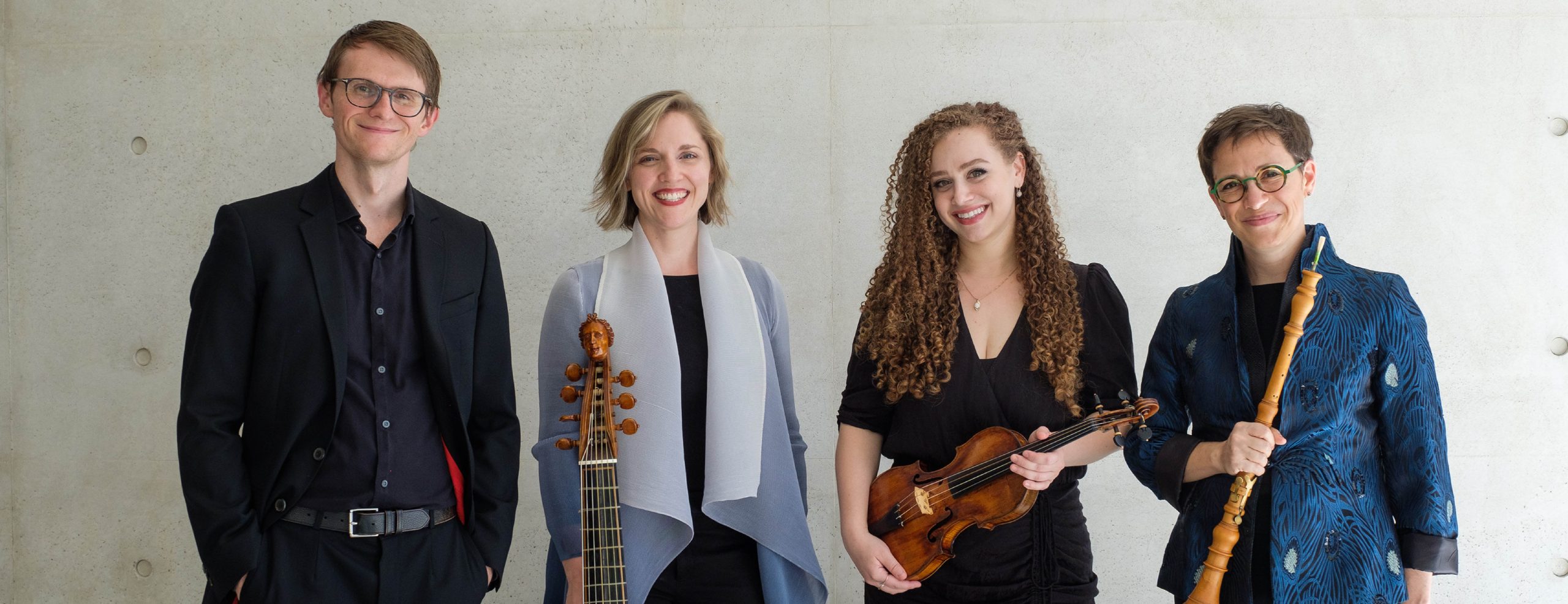 Image showing guest ensemble Les Délices. There are 4 individuals. 3 of them are holding their instruments.