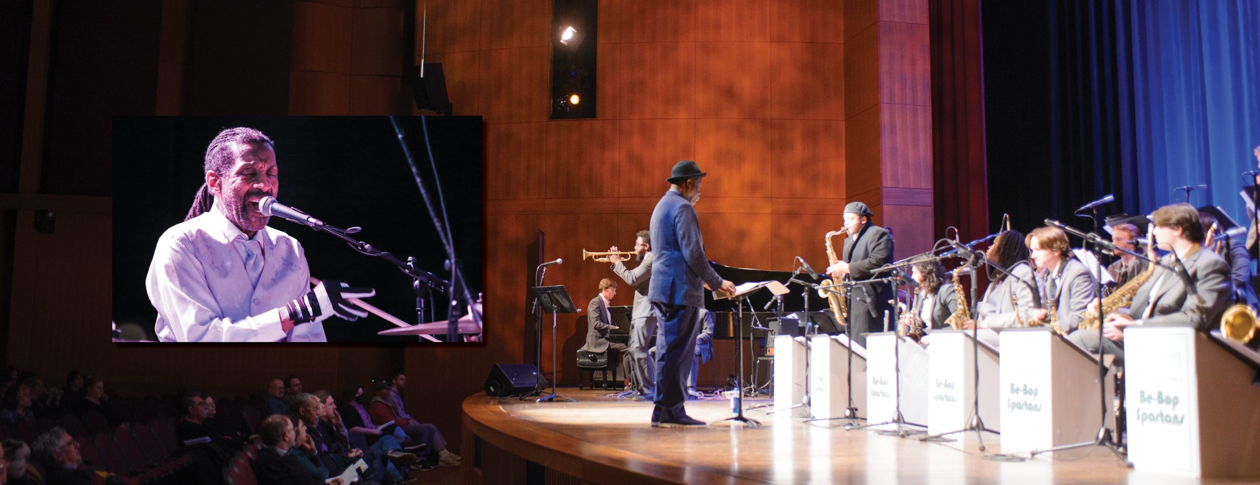 Wide image of MSU Jazz Orchestras performing on stage, directed by a conductor. Inset image on the left shows guest artist Leonard Clyde King playing the drums.