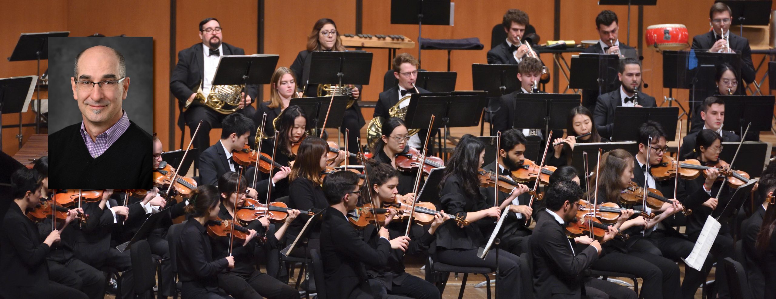 Main image shows MSU Orchestra playing on stage in front of music stands. In the upper left corner, there is an inset image that shows a guest composer headshot.