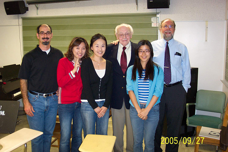 group of people in a music classroom